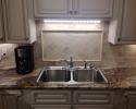 These granite kitchen countertops add a regal beauty to this space! 