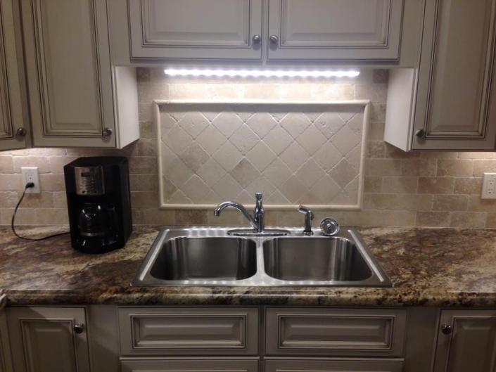These granite kitchen countertops add a regal beauty to this space! 
