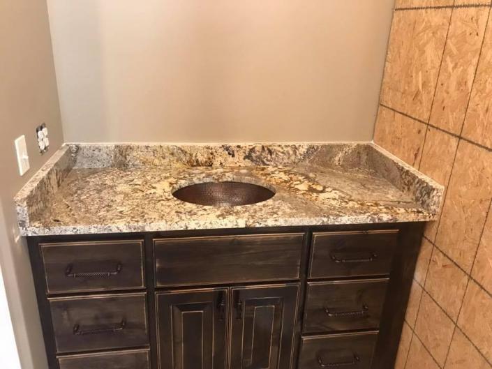 The simple addition of a granite countertop can do wonders for your bathroom! 