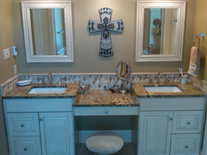 By installing these granite sinks we've created settle elegance in this bathroom. 